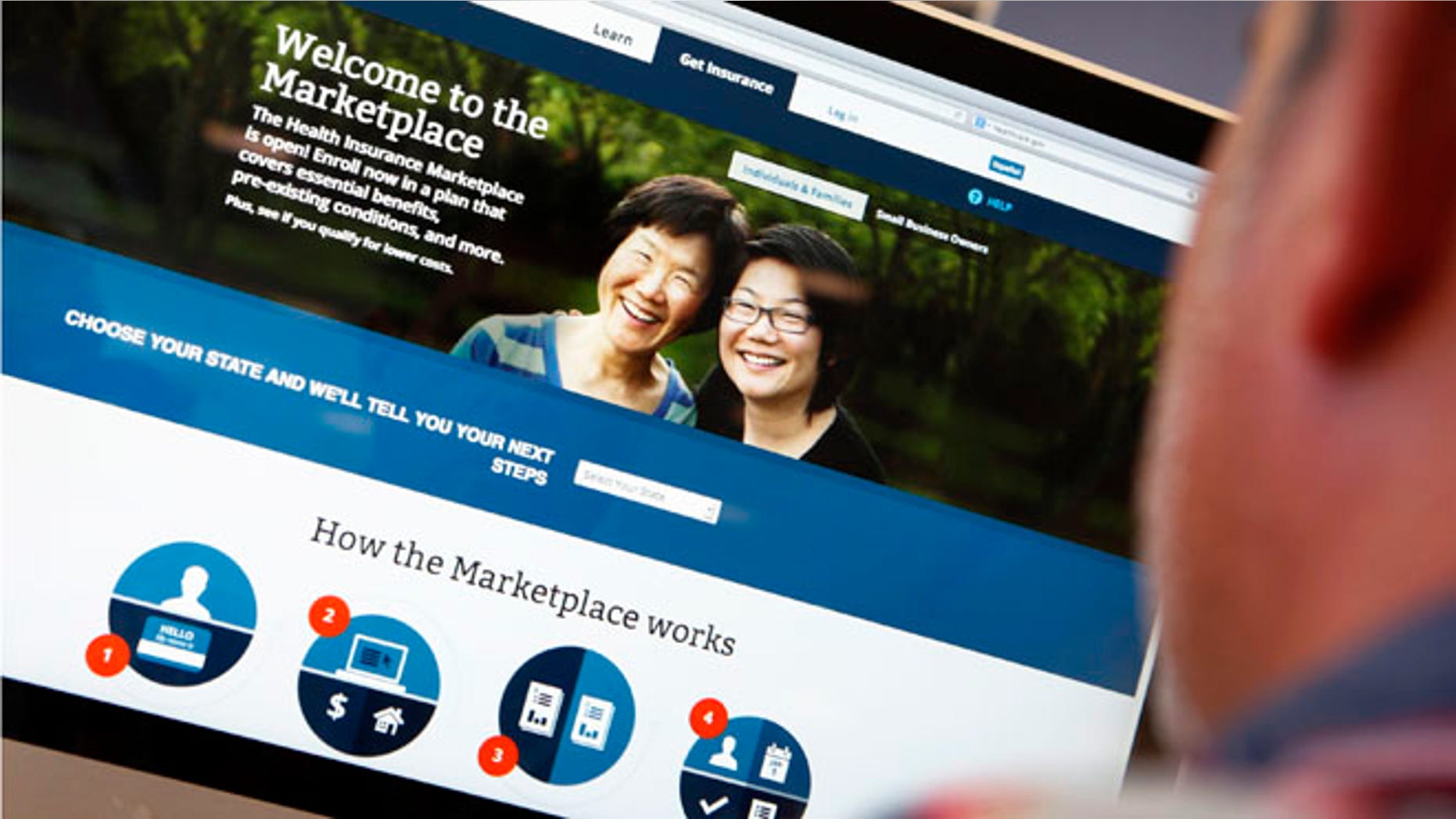 Oct. 2, 2013: A man looks over the Affordable Care Act (commonly known as Obamacare) signup page on the HealthCare.gov website in New York in this photo illustration.