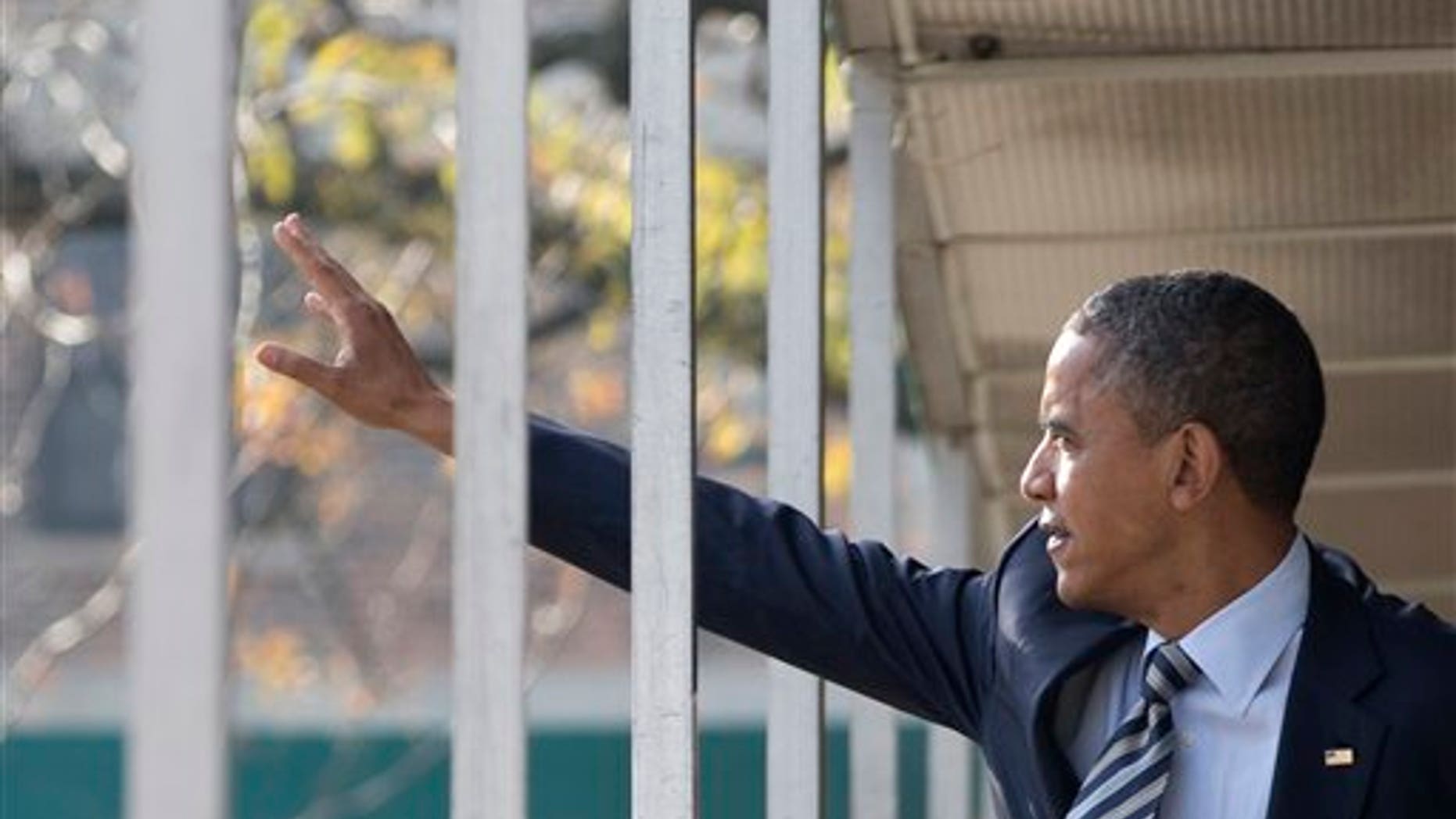 Nov. 6, 2012: Obama walks through a hallway on Election Day.