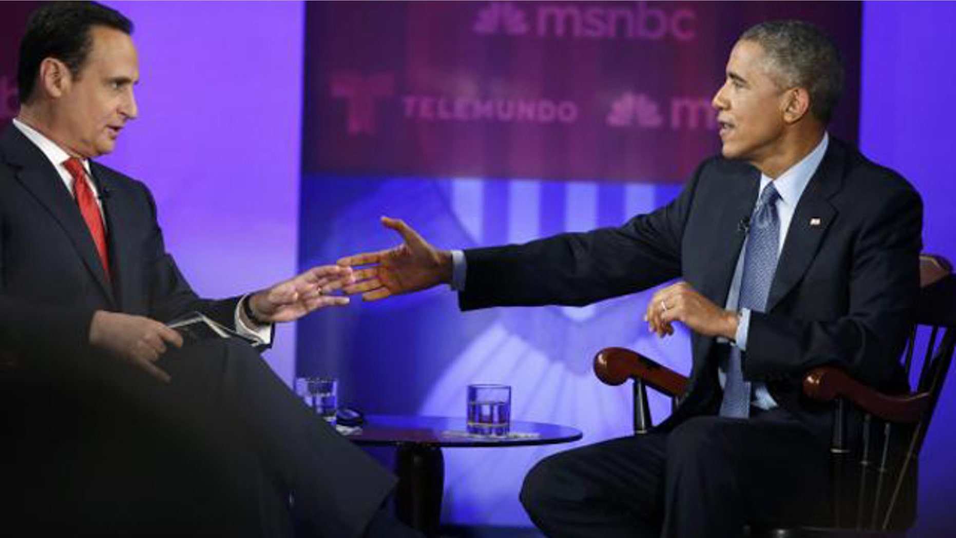 Feb. 26, 2015: U.S. President Barack Obama participates in the taping of an town hall discussion on immigration with host Jose Diaz-Balart at Florida International University in Miami. (Reuters/Jonathan Ernst)