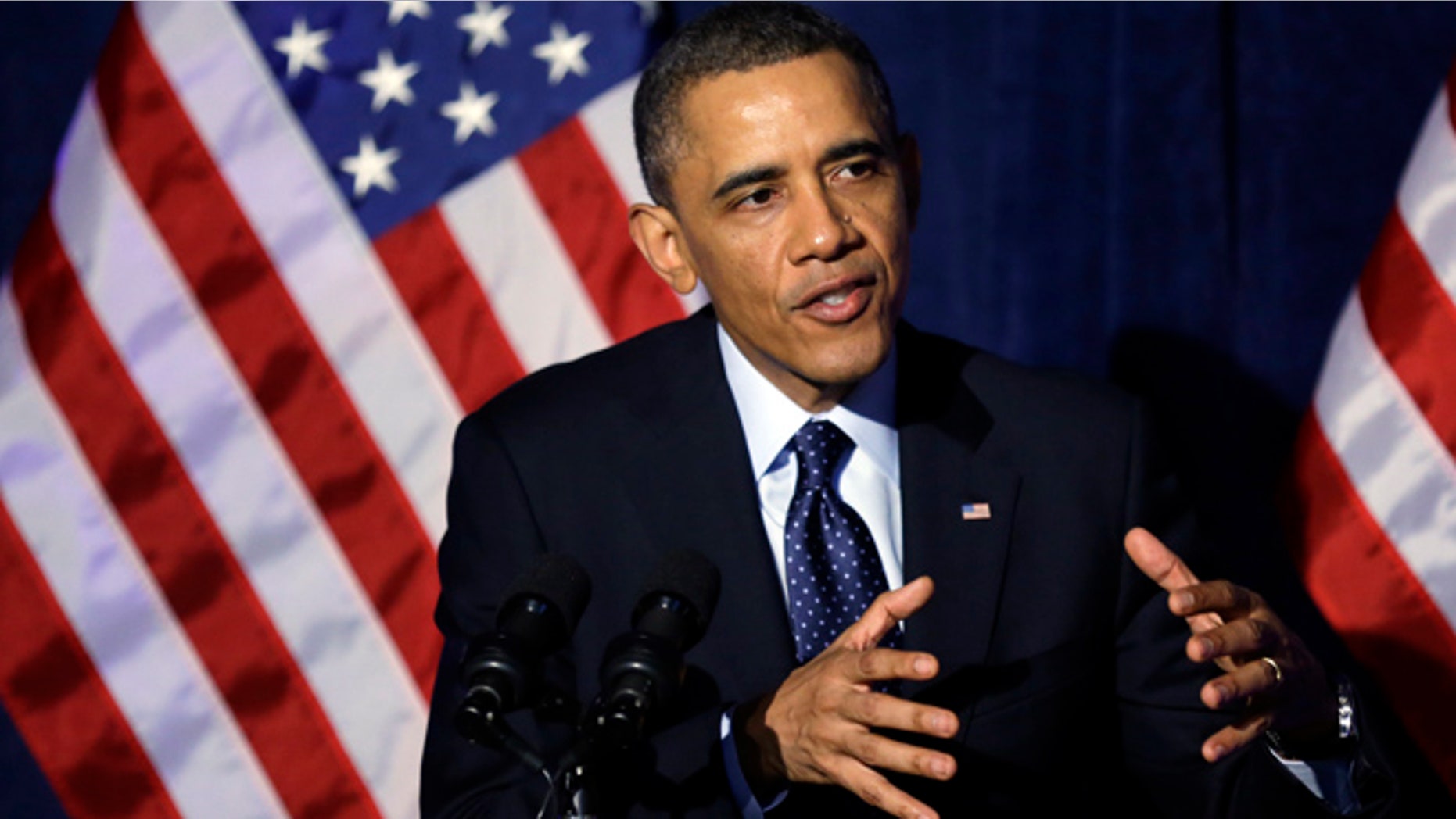 FILE: March 13, 2013: President Barack Obama speaks at the Organizing for Action dinner in Washington.