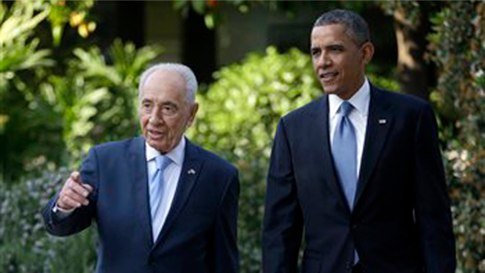 March 20: President Obama tours the garden of the President's Residence with Israeli President Shimon Peres in Jerusalem, Israel.