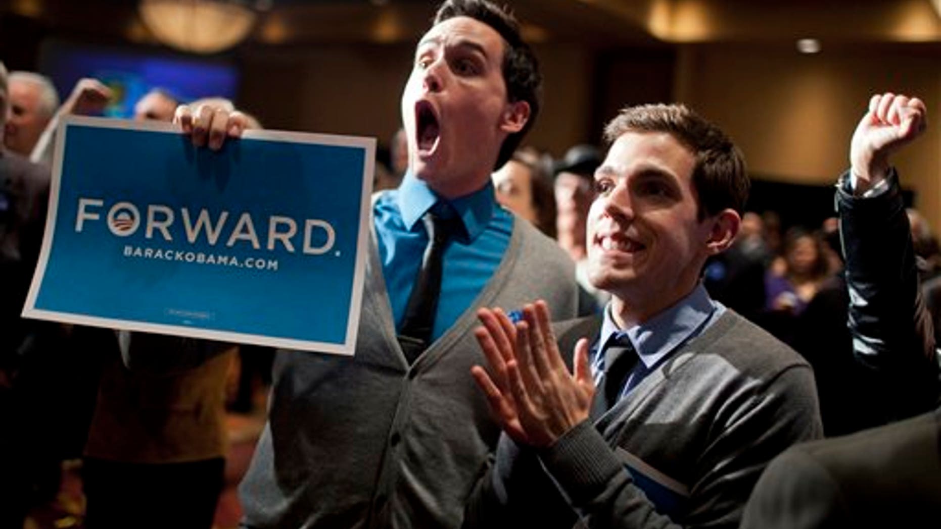 Nov. 6, 2012: New Mexico democrats including Clint Milhollin, left, and his boyfriend Will Toledo, celebrate at the Embassy Suites.