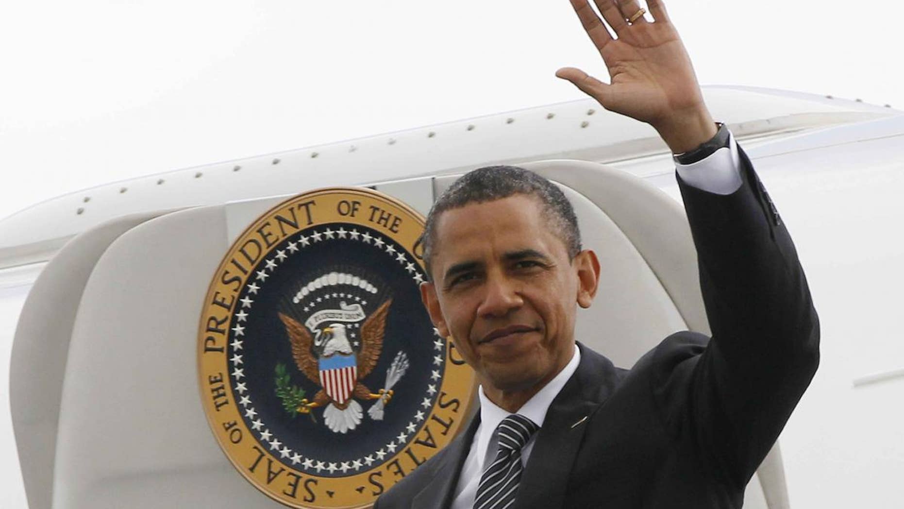 President Barack Obama steps off Air Force One in France. (AP Photo/Charles Dharapak)