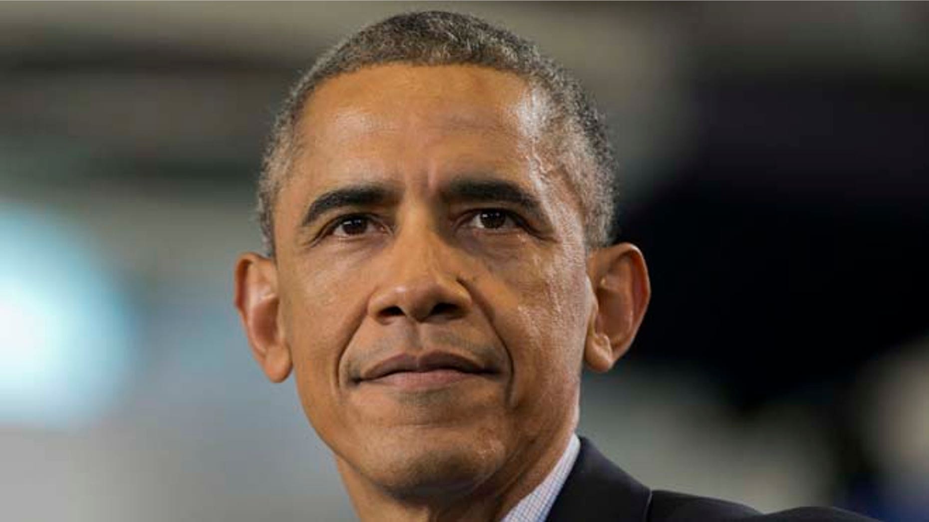 In this Sunday, Nov. 2, 2014 photo shows President Barack Obama during a campaign event at Central High School in Bridgeport, Conn.