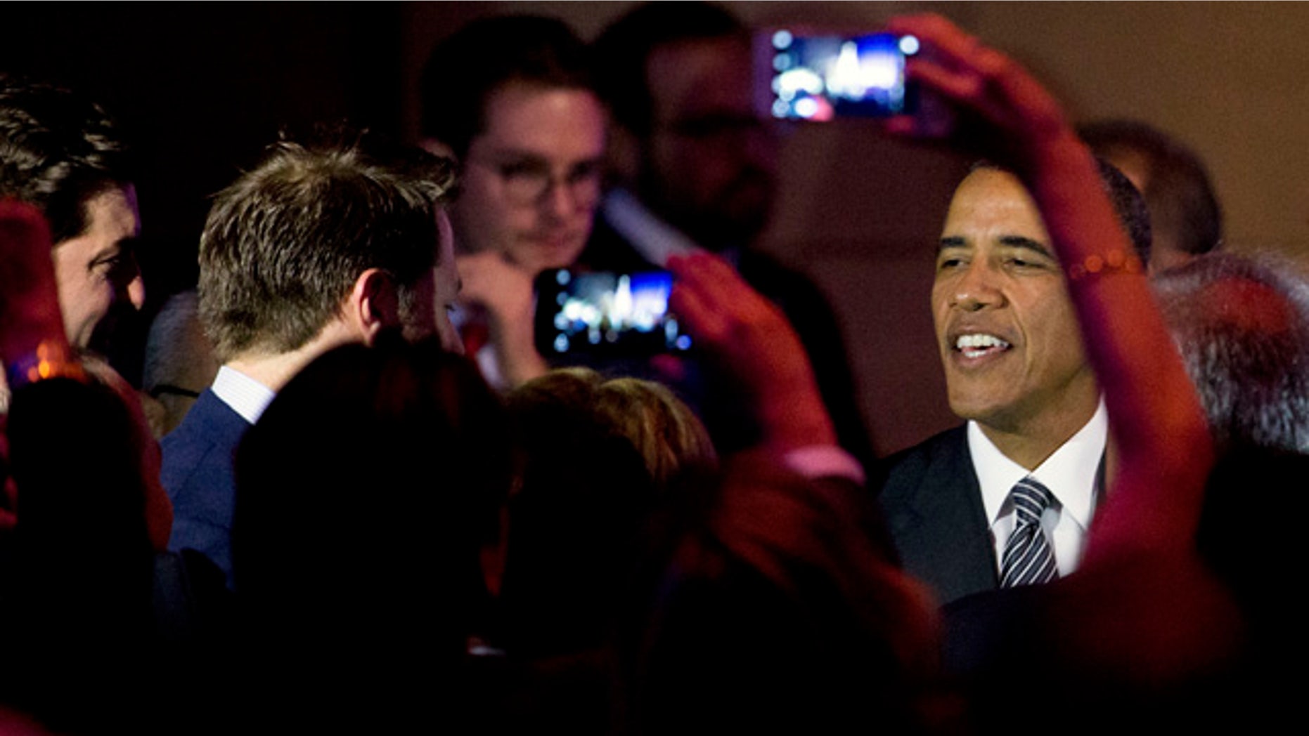 Sept. 27, 2015: President Barack Obama greets members of the crowd after speaking at a Democratic National Committee LGBT fundraising gala at Gotham Hall in New York. (AP Photo/Andrew Harnik)
