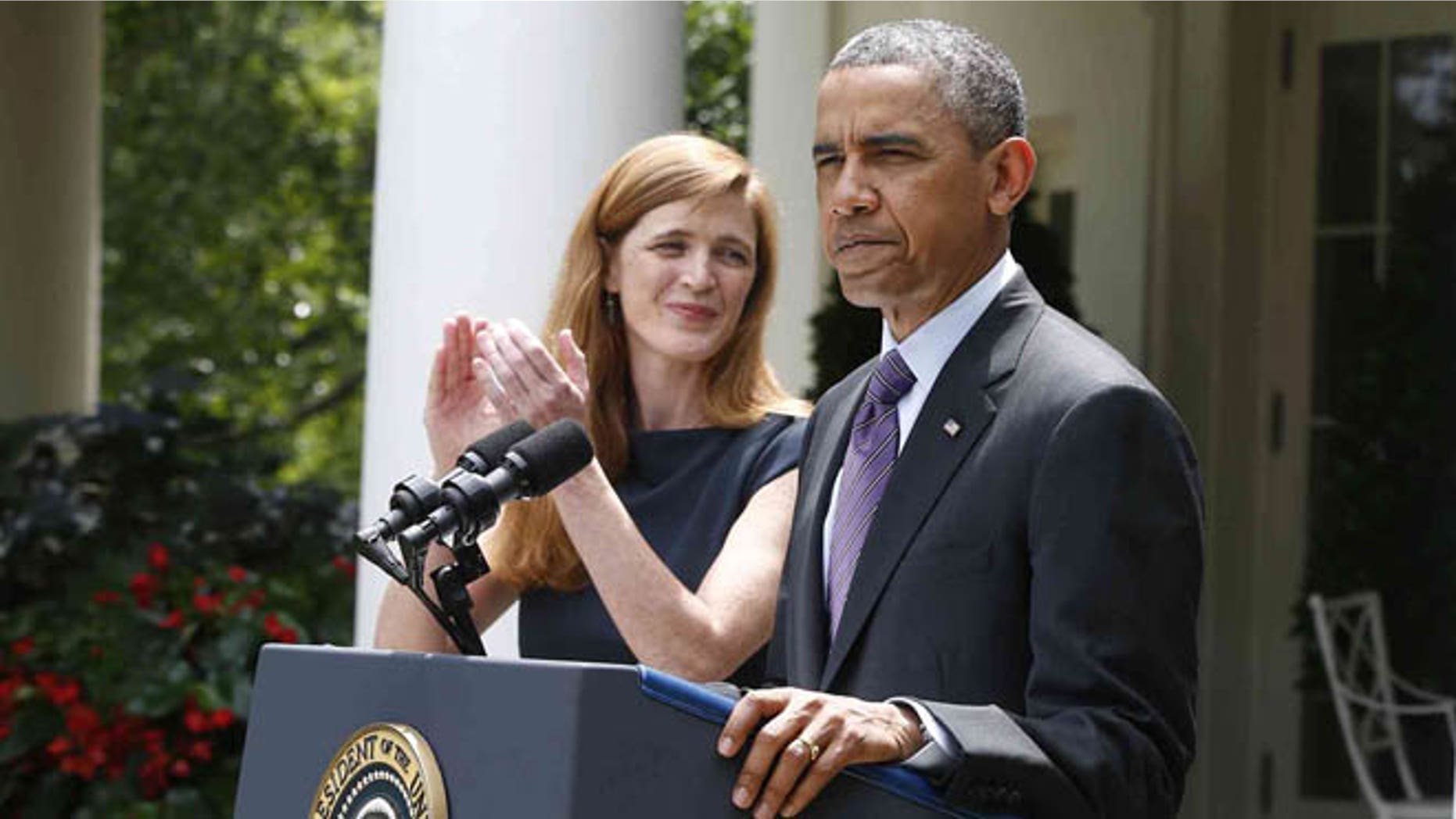 President Barack Obama stands with Samantha Power, his nominee to be the next UN Ambassador, left, Wednesday, June 5, 2013, in the Rose Garden at the White House in Washington.