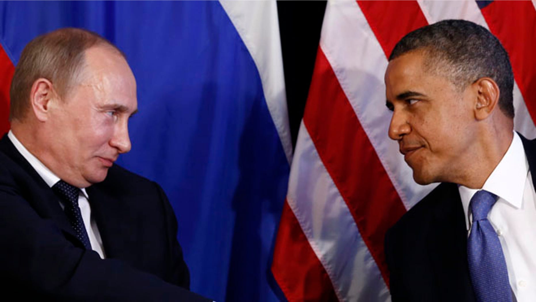FILE: June 18, 2012: President Obama and Russian President Vladimir Putin, in Los Cabos, Mexico.