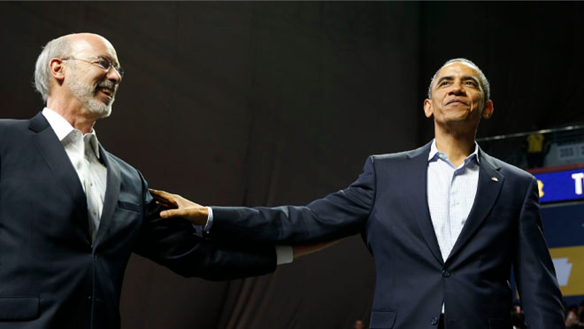 FILE: Nov. 2, 2014: President Obama with Tom Wolf, who is running for Pennsylvania governor, Temple University, Philadelphia, Pa.
