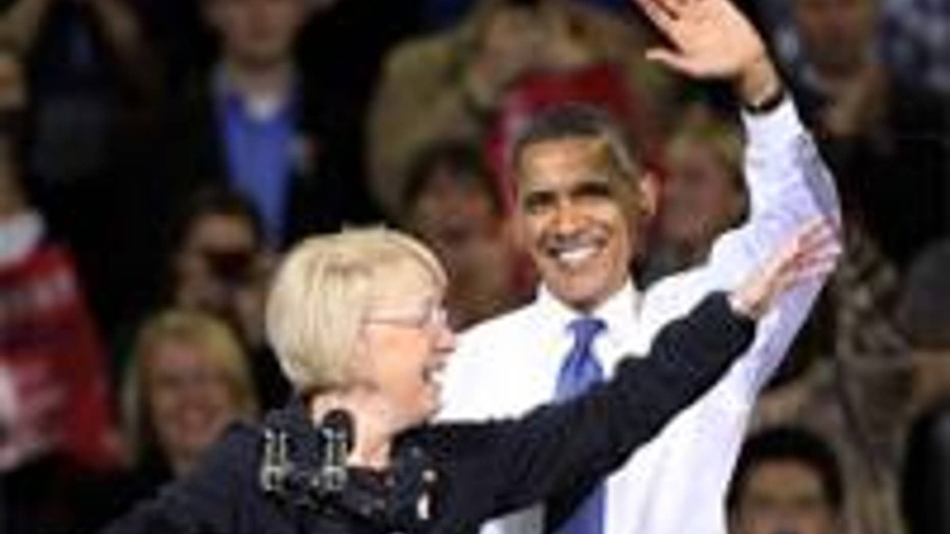 President Barack Obama and Sen. Patty Murray, D-Wash., wave during at a rally at the University of Washington in Seattle, Thursday, Oct. 21, 2010. (AP Photo)