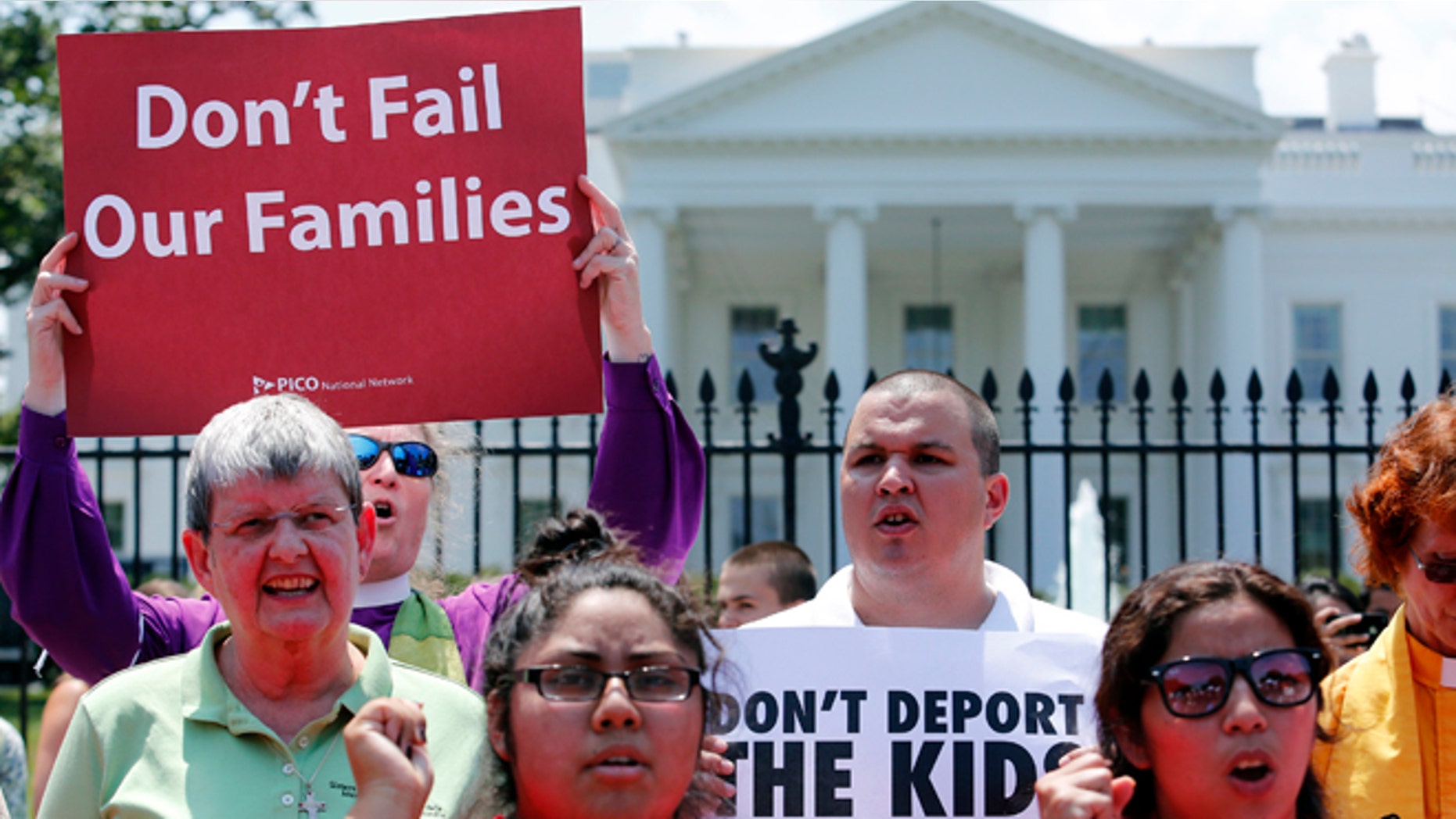 FILE: July 31, 2014: Church groups protest against President Obama's immigration policies outside the White House, Washington, D.C.