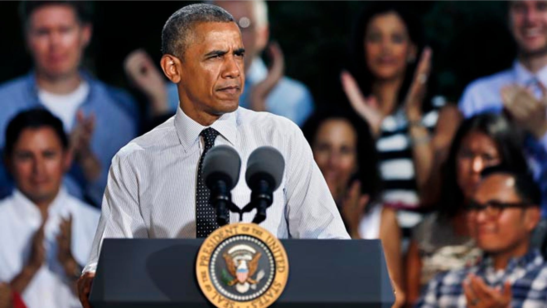 President Barack Obama speaks about the economy, Wednesday, July 9, 2014, at Cheesman Park in Denver.