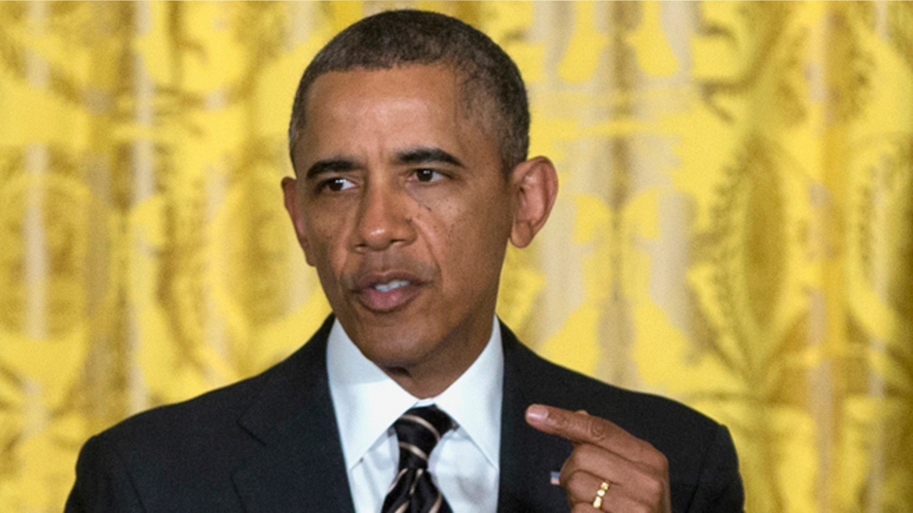 FILE:Jan. 23, 2014: President Obama in the East Room of the White House in Washington, D.C.