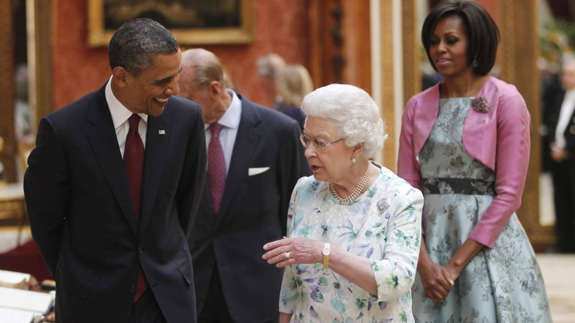 President Barack Obama, first lady Michelle Obama, Britain's Queen Elizabeth II and Prince Philip tour the Portrait Gallery at Buckingham Palace in London, Tuesday, May 24, 2011. (AP Photo/Charles Dharapak)