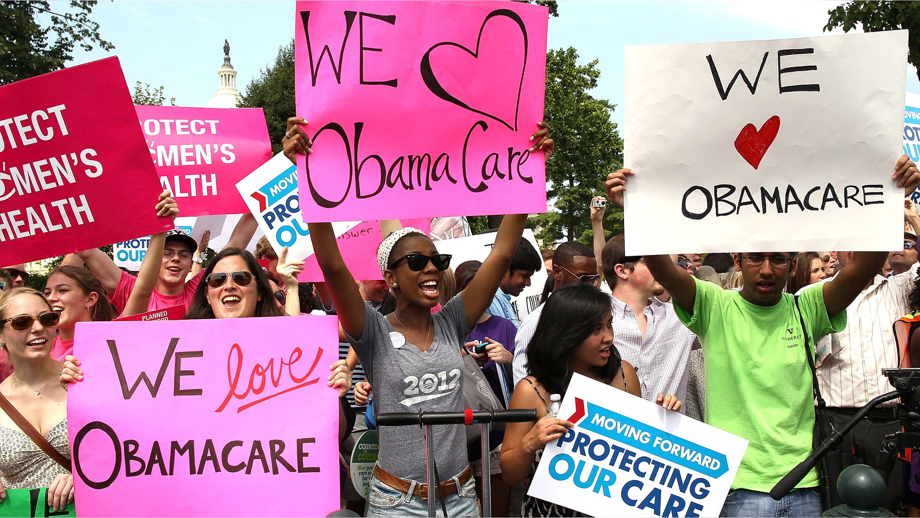 WASHINGTON, DC - JUNE 28: Obamacare supporters react to the U.S. Supreme Court decision to uphold President Obama's health care law, on June 28, 2012 in Washington, DC. Today the high court upheld the whole healthcare law of the Obama Administration. (Photo by Mark Wilson/Getty Images)