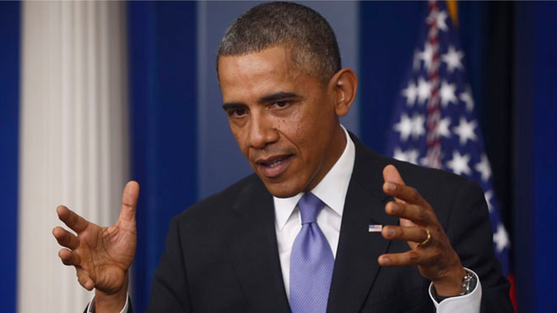 Nov. 14, 2013: President Barack Obama gestures as he speaks about his signature health care law.