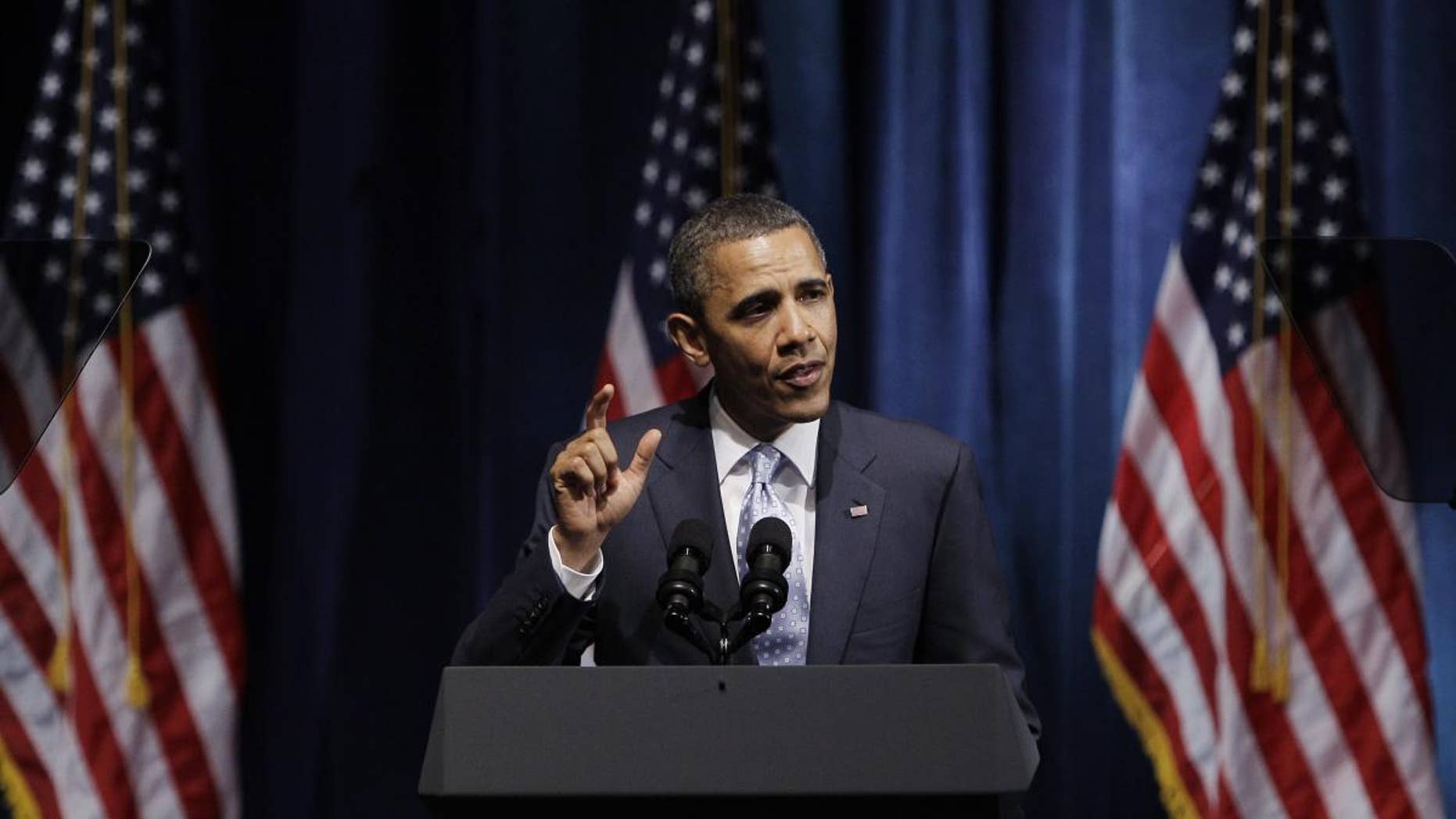 AP image/President Obama at a DNC fundraiser in Texas