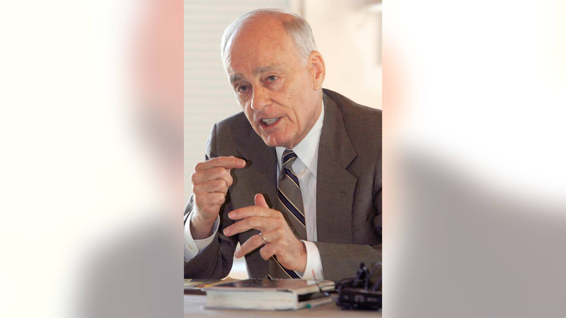 File-This Sept. 18, 2008, file photo shows Vincent Bugliosi speaking at a news conference in Burlington, Vt. The prosecutor in the Charles Manson trial who went on to write the best-selling true-crime book, “Helter Skelter,” has died. Bugliosi was 80 years old. His son Vincent Bugliosi Jr. tells the Associated Press Monday, June 8, 2015, that Bugliosi died of cancer Saturday at a hospital in Los Angeles. (AP Photo/Toby Talbot, File)