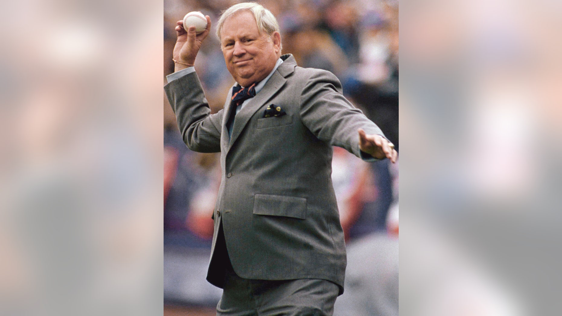 in this April 8, 1987 file photo, New York Mets general manager Frank Cashen throws out the first ball during the opening day ceremonies at New Yorks Shea Stadium.