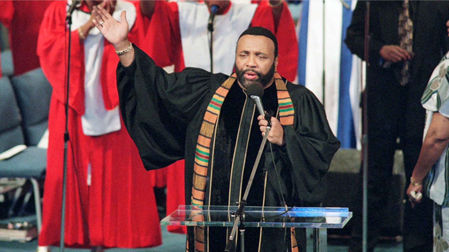 FILE - In this Sept. 1, 1996 file photo, Grammy winning gospel singer Andrae Crouch sings during service at the Christ Memorial church in Pacoima, Calif. Crouch, a legendary gospel performer, songwriter and choir director whose work graced songs by Michael Jackson and Madonna and movies such as The Lion King, has died at age 72. (AP Photo/Frank Wiese, File)