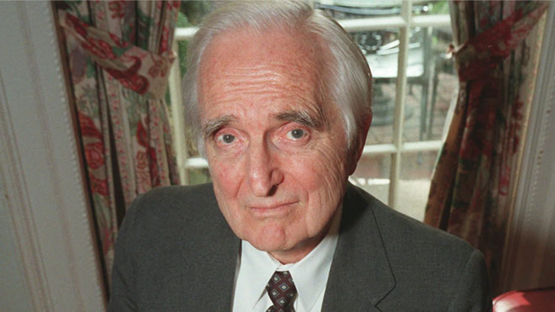 April 9, 1997: In this file photo, Doug Engelbart, inventor of the computer mouse and winner of the half-million dollar 1997 Lemelson-MIT prize, poses with the computer mouse he designed, in New York.