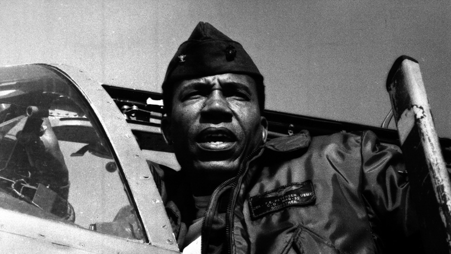 This undated photo provided by the Marine Corps shows Lt. Gen. Frank E. Petersen, Jr., the first black aviator and brigadier general in Marine Corps. Frank E. Petersen III said his father died Tuesday, Aug. 25, 2015, at his home in Stevensville, on Maryland's Kent Island, of complications from lung cancer. He was 83. (Marine Corps via AP)