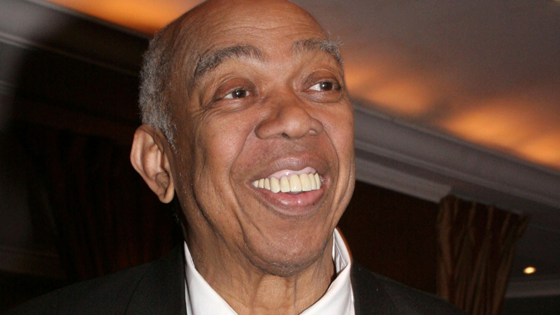 In this March 10, 2005 file photo, Geoffrey Holder poses at the French Institute Alliance Francaise' "La Nuit des Etoiles" dinner in New York, honoring French actress Catherine Deneuve.