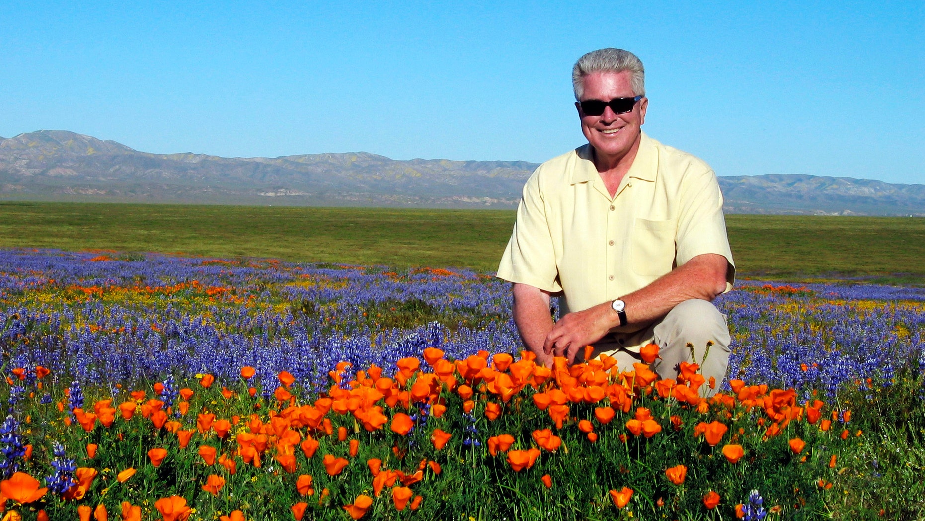 2005 FILE: TV host Huell Howser poses for a photo at the Antelope Valley California Poppy Reserve in Lancster, Calif.