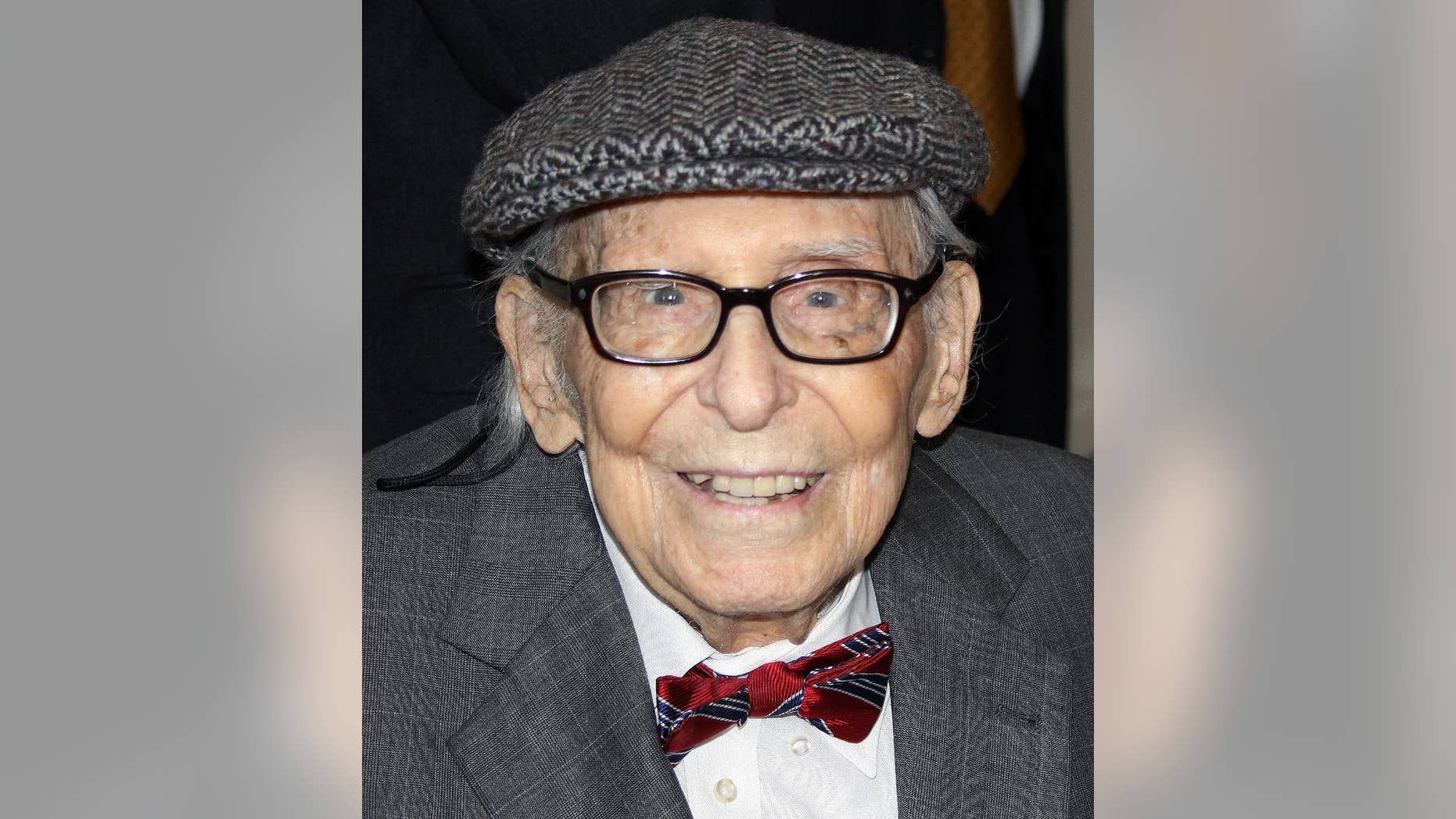 This March 8, 2014 photo provided by Darlene Shields shows Bob Simpson at a luncheon in his honor in Washington. Simpson, a meteorologist who co-developed the Saffir-Simpson Hurricane Wind Scale which estimates potential property damage, has died. His daughter, Peg Simpson, said he died early Friday, Dec. 19, 2014 at his home in Washington. He was 102. (AP Photo/Darlene Shields)