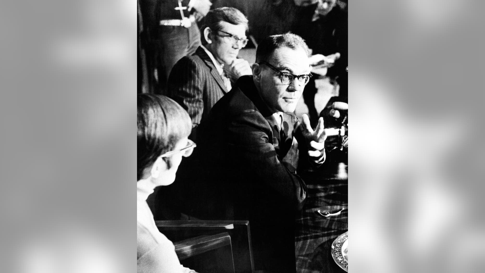FILE - In this March 13, 1973 file photo, John T. Downey, a former Central Intelligence Agency agent who spent 20 years as a prisoner in China during the Cold War, speaks during a news conference in New Britain, Conn. The office of Connecticut Gov. Dannel P. Malloy said that Downey, who later served as a Connecticut judge, died Monday, Nov. 17, 2014. He was 84. (AP Photo/Bob Child, File)