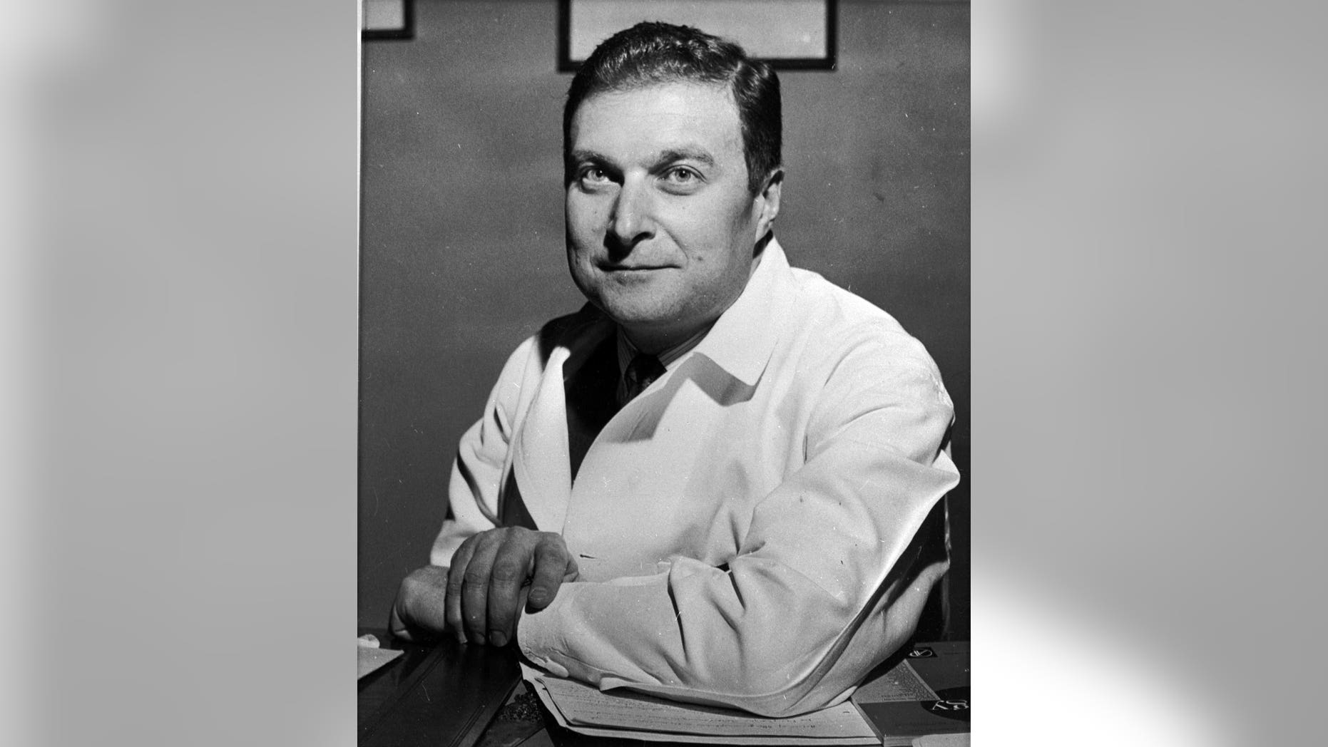 FILE - This Feb. 1961 file photo show Dr. Hilary Koprowski. Dr. Hilary Koprowski, a pioneering virologist who developed the first successful oral vaccination for polio, died Thursday, April 11, 2013 at his suburban Philadelphia home. He was 96. (AP Photo/File)