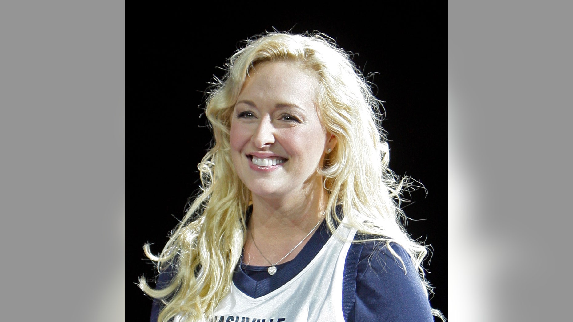 FILE - In this Nov. 14, 2008 file photo, Country singer Mindy McCready performs, in Nashville, Tenn. McCready, who hit the top of the country charts before personal problems sidetracked her career, died Sunday, Feb. 17, 2013. She was 37. (AP Photo/Mark Humphrey, File)