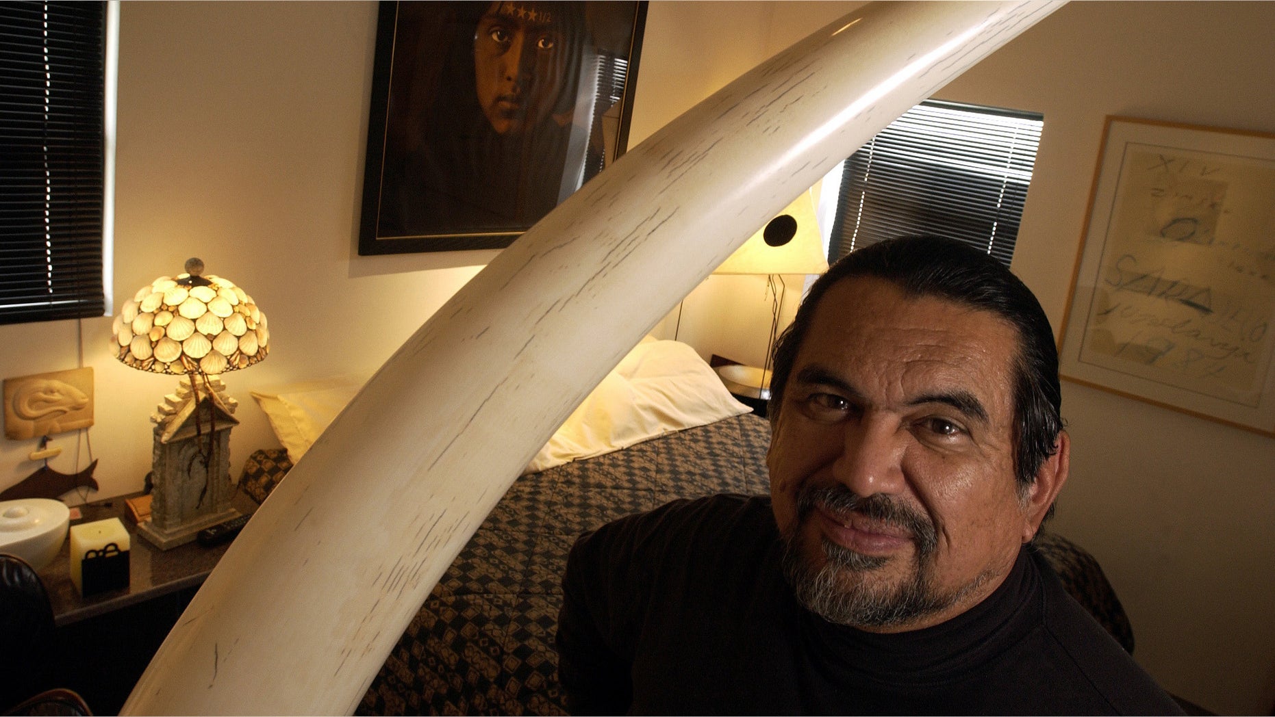 Sculptor Jesus Moroles in his home in Rockport, Texas, in a Feb. 2004 file photo.