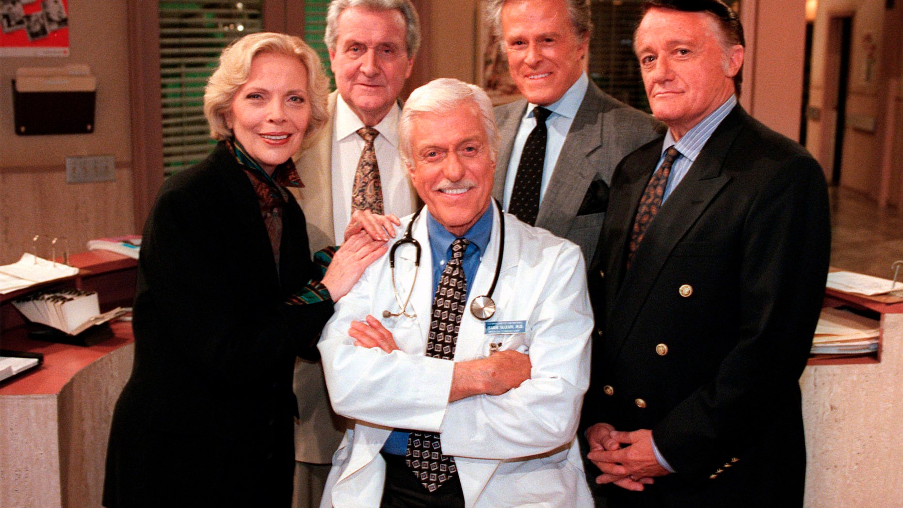 FILE - In this Oct. 16, 1997 file photo, Dick Van Dyke, center, poses with his guest stars, from left, Barbara Bain, Patrick Macnee, Robert Culp and Robert Vaughn, on "Diagnosis Murder" during a break on the set of the CBS series in the Van Nuys section of Los Angeles.