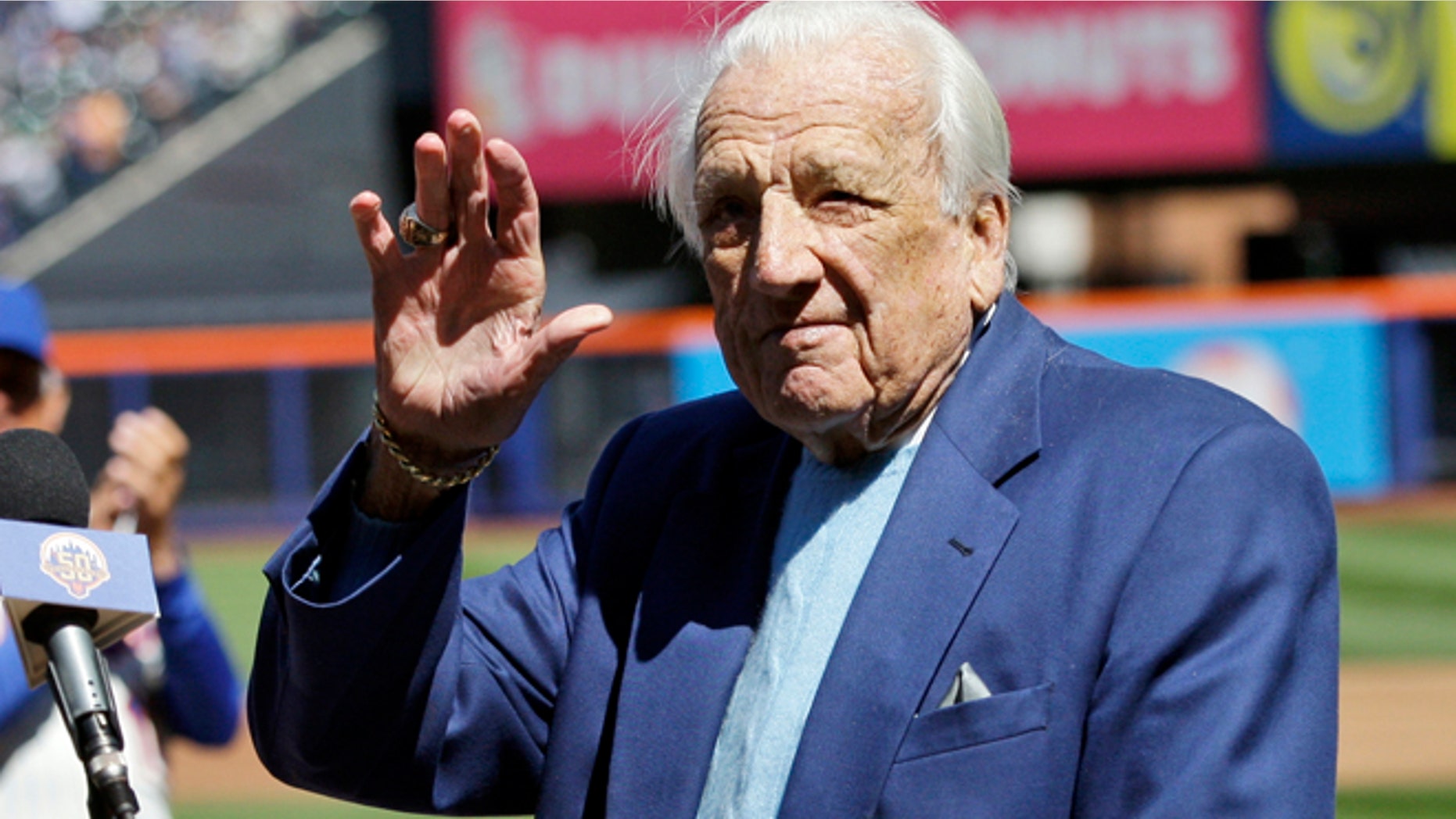 April 5, 2012: In this file photo, Hall of Famer Ralph Kiner waves to the crowd before announcing the New York Mets starting line-up before an opening day baseball game against the Atlanta Braves at Citi Field in New York.