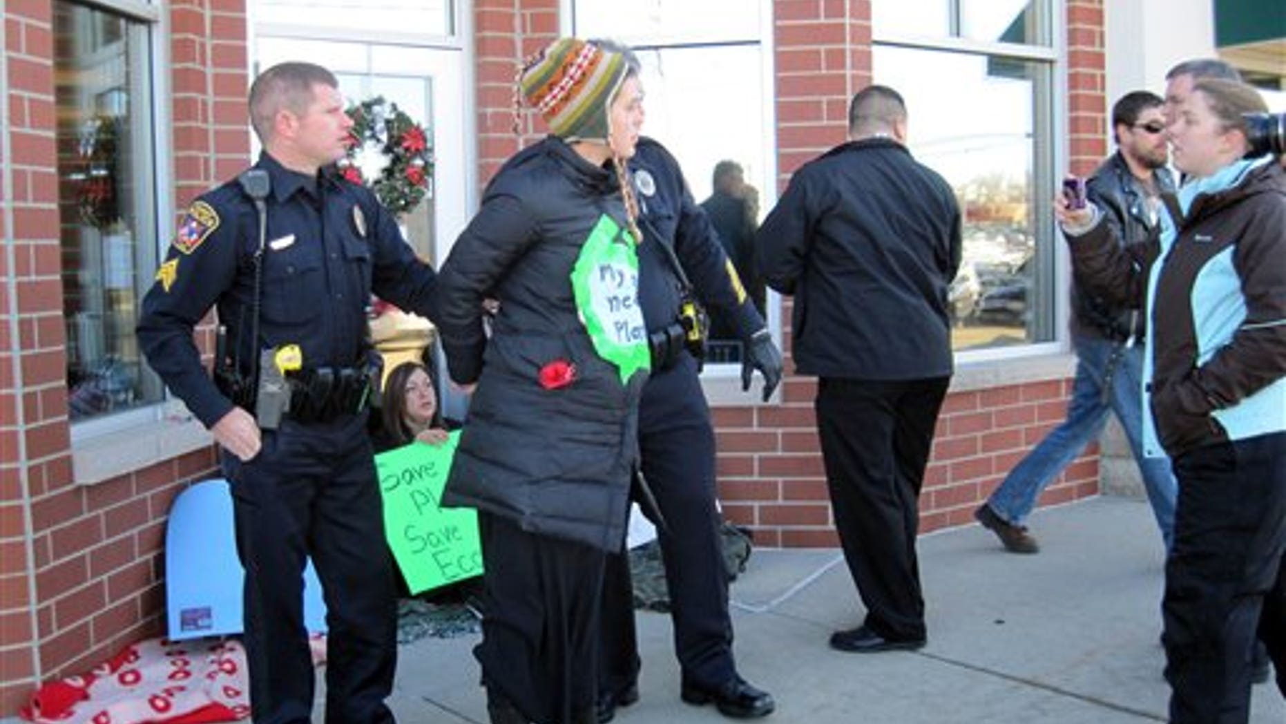 Dec. 29: Megan Felt, 24, is arrested while protesting Ron Paul's stance on the Environmental Protection Agency outside his Ankeny, Iowa, campaign office.