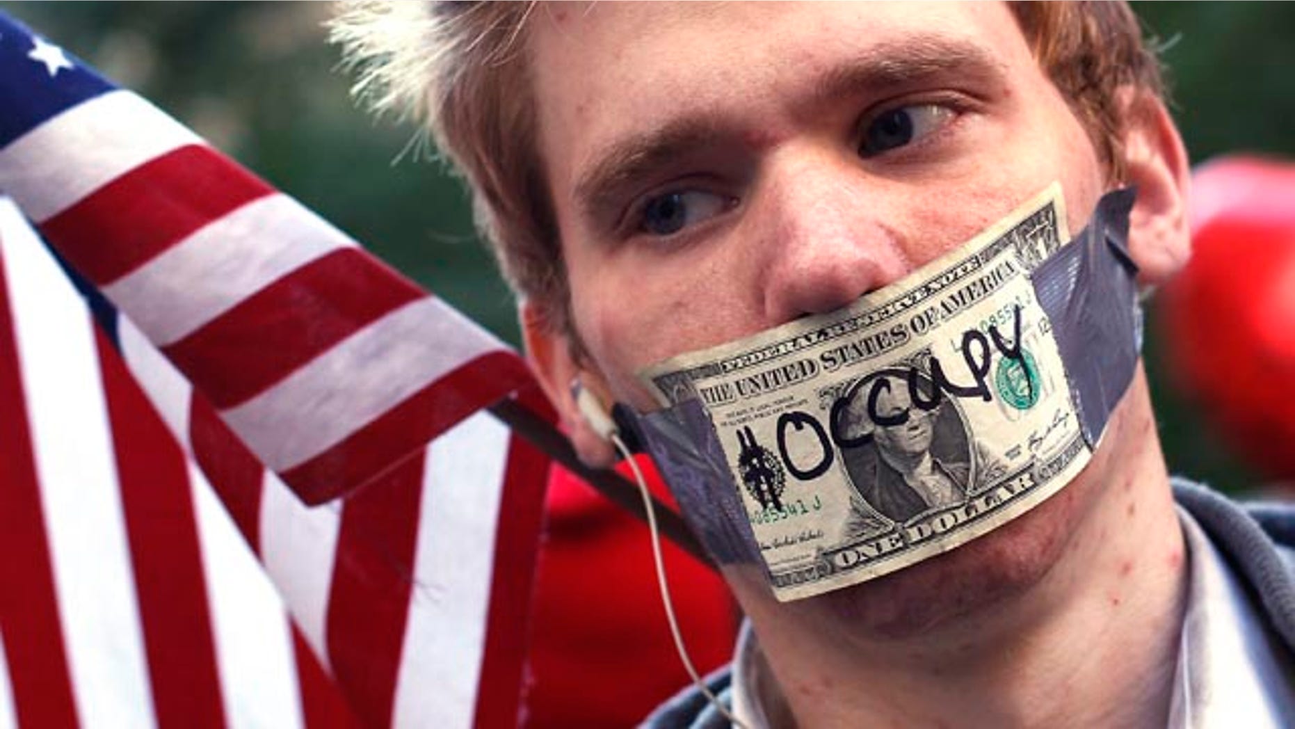 Oct. 17, 2011: An Occupy Wall Street campaign demonstrator stands in Zuccotti Park, near Wall Street in New York.
