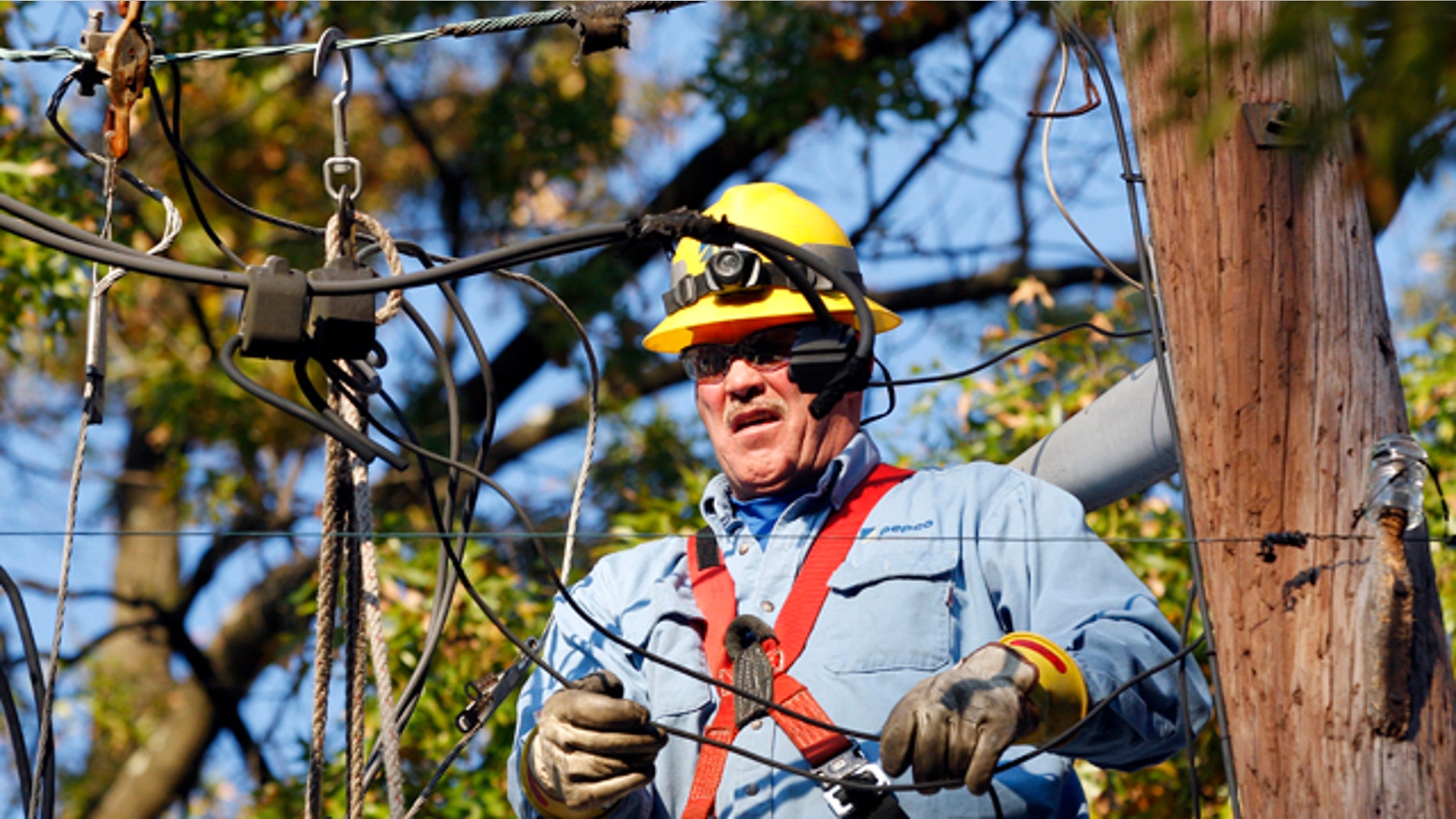 Nov. 2: Potomac Electric Power Company worker Mike Fitzgerald works to restore power to homes left in the dark since last Saturday's storm in Teaneck, N.J.