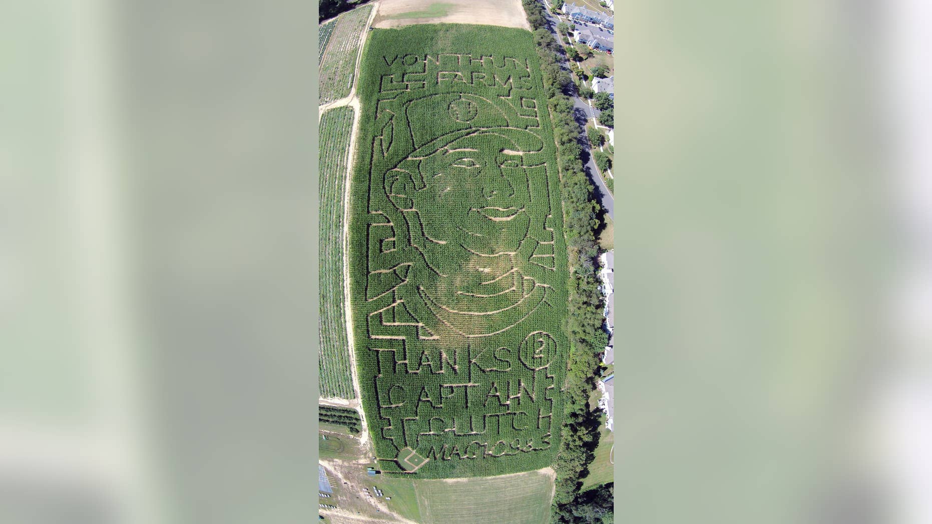 This Sept. 10, 2014, aerial drone photo provided by Seasoned Media depicts a corn maize honoring New York Yankees' Derek Jeter at a South Brunswick, N.J., farm. The VonThun Farm in central New Jersey, about 55 miles south of Yankee Stadium, carved a likeness of the Yankees captain and a thank you message to him into its five-acre corn maze. (AP Photo/Seasoned Media)