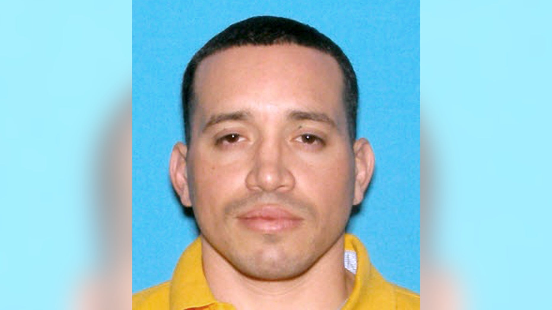 This undated identification photo released by the Massachusetts State Police shows Jorge Zambrano, killed Sunday, May 22, 2016, during an exchange of gunfire with police at an apartment building in Oxford, Mass. Zambrano had been suspected in the shooting death of Auburn, Mass., Police Officer Ronald Tarentino during a traffic stop early Sunday morning. (Massachusetts State Police via AP)