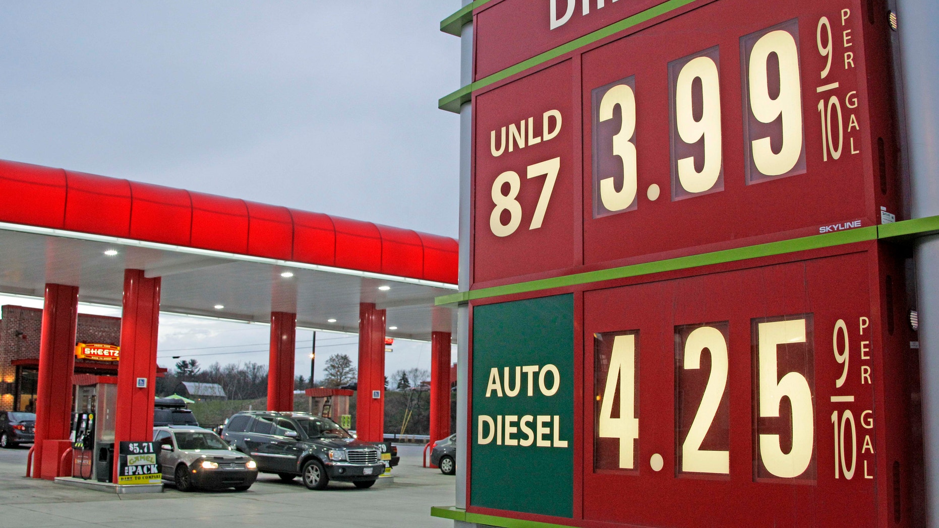 Gas prices are posted at a gas station in Breezewood, PA.