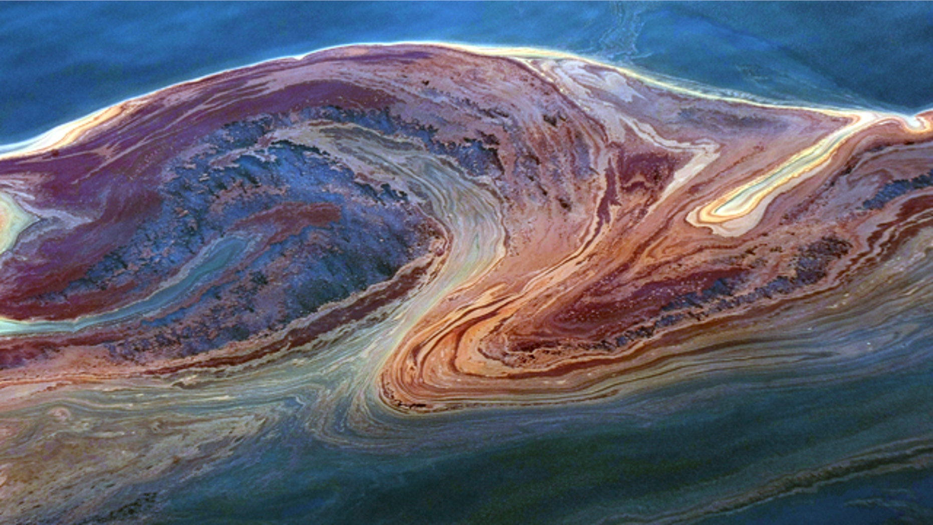 Oil that leaked from a broken oil well following an explosion on a drilling rig swirls through the currents in the Gulf of Mexico.