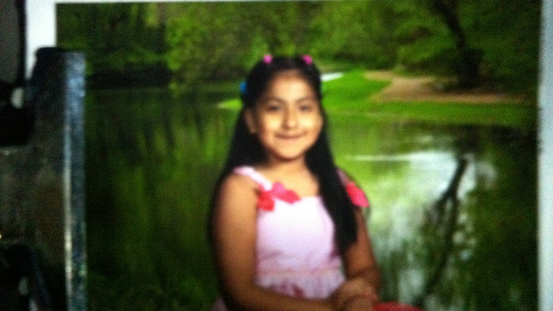 This photo provided by the Oklahoma Department of Public Safety, shows Montserrat Aguirre. An Amber Alert has been issued for the 8-year-old Aguirre, of Tulsa, who was apparently snatched by a motorist from outside an apartment. Aguirre was playing on a swing set at about 7:20 p.m. Sunday, May 4, 2014, when a small white car pulled up and a white man got out, grabbed her and put her in the car before driving away. (AP/Oklahoma Department of Public Safety)