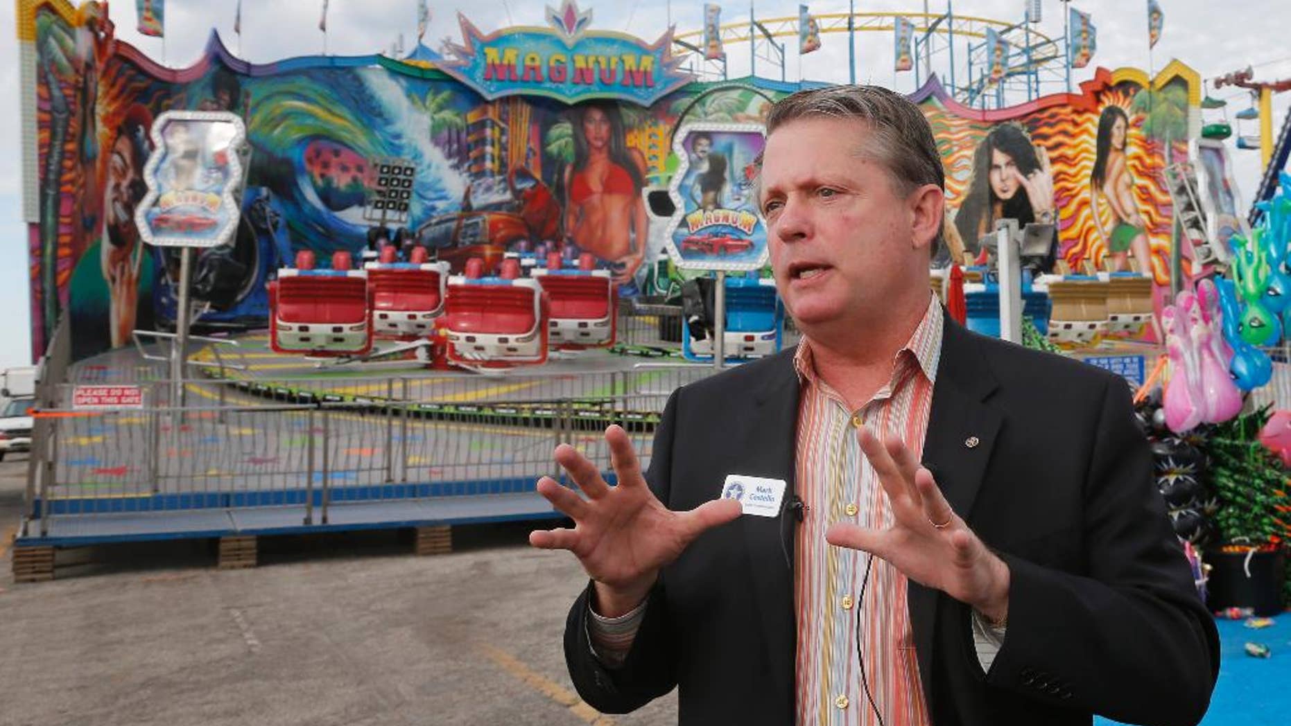 FILE - In this Wednesday, Sept. 10, 2014, file photo, Oklahoma Labor Commissioner Mark Costello speaks during a news conference at the state fairgrounds in Oklahoma City. Authorities say Costello has died after a stabbing at an Oklahoma City restaurant on Sunday, Aug. 23, 2015. (AP Photo/Sue Ogrocki, File)