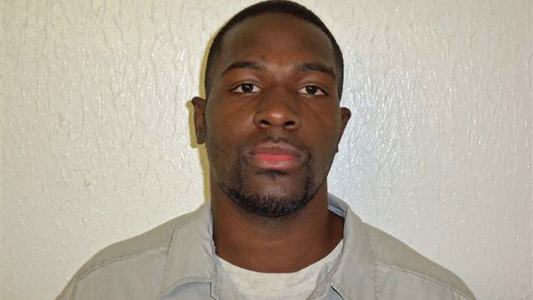 This March 21, 2011 photo provided by the Oklahoma Department of Corrections shows Alton Nolen, of Moore, Okla. Prison records indicate that Nolen, the suspect in the beheading of a co-worker at an Oklahoma food processing plant Thursday, Sept. 25, 2014, had spent time in prison and was on probation for assaulting a police officer. (AP Photo/Oklahoma Department of Corrections)