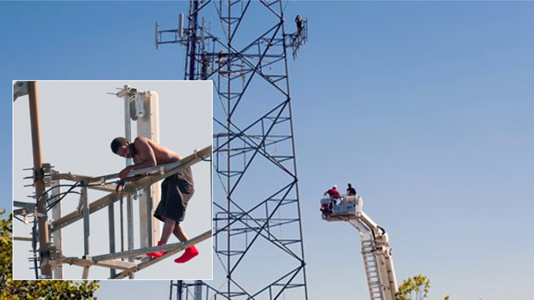 Aug. 14: Negotiators in a firetruck ladder bucket attempt to make contact with the man in the tower.