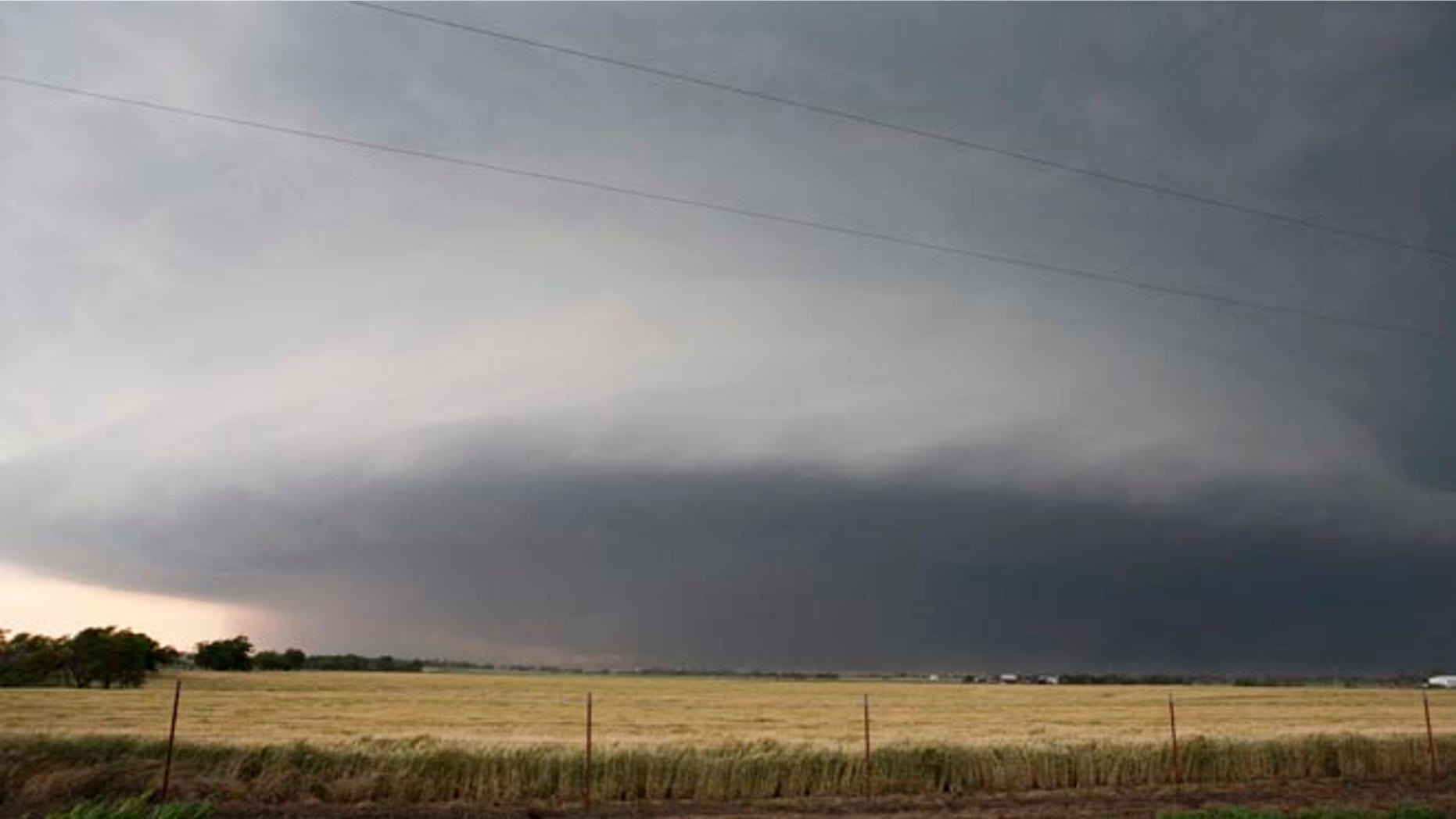 May 31, 2013: In this file photo a tornado forms near Banner Road and Praire Circle in El Reno, Okla. The National Weather Service says the deadly tornado that struck near Oklahoma City late last week was another top-of-the-scale EF5 that packed winds reaching 295 mph.