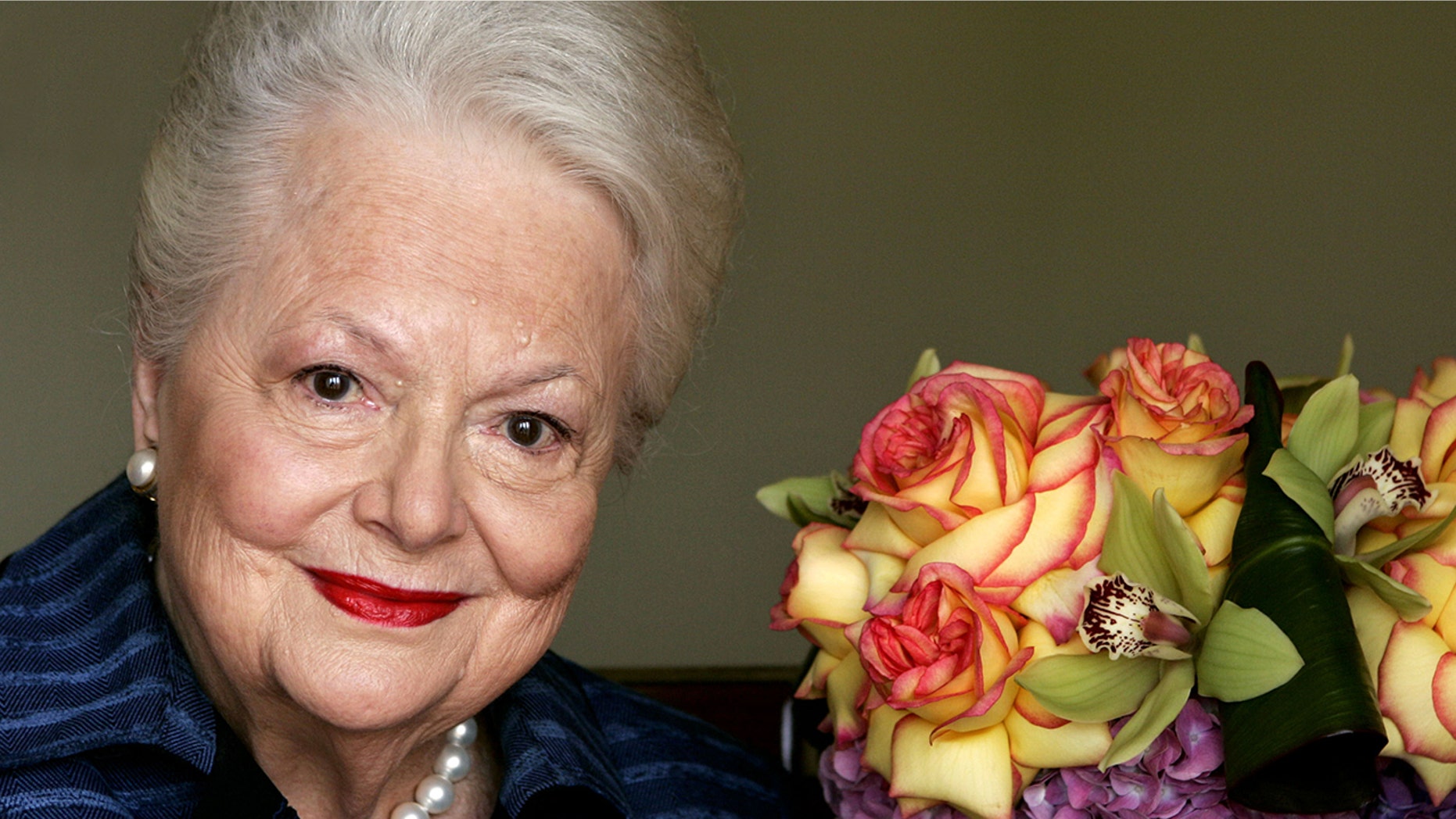 Actress Olivia de Havilland, who played the doomed Southern belle Melanie in "Gone With the Wind," poses for a photograph Wednesday, Sept. 15, 2004, in Los Angeles. (AP Photo/Kevork Djansezian)