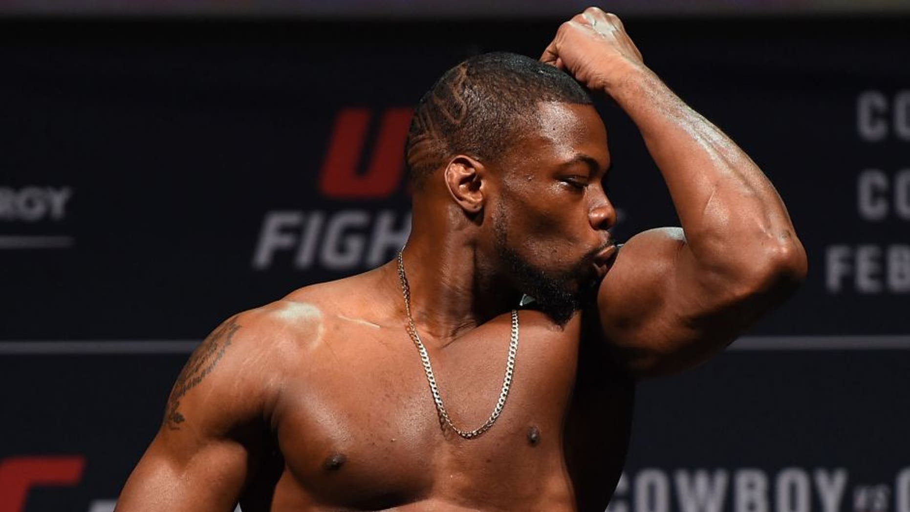 PITTSBURGH, PA - FEBRUARY 20: Oluwale Bamgbose of the United States steps on the scale during the UFC Fight Night weigh-in at Stage AE on February 20, 2016 in Pittsburgh, Pennsylvania. (Photo by Jeff Bottari/Zuffa LLC/Zuffa LLC via Getty Images)
