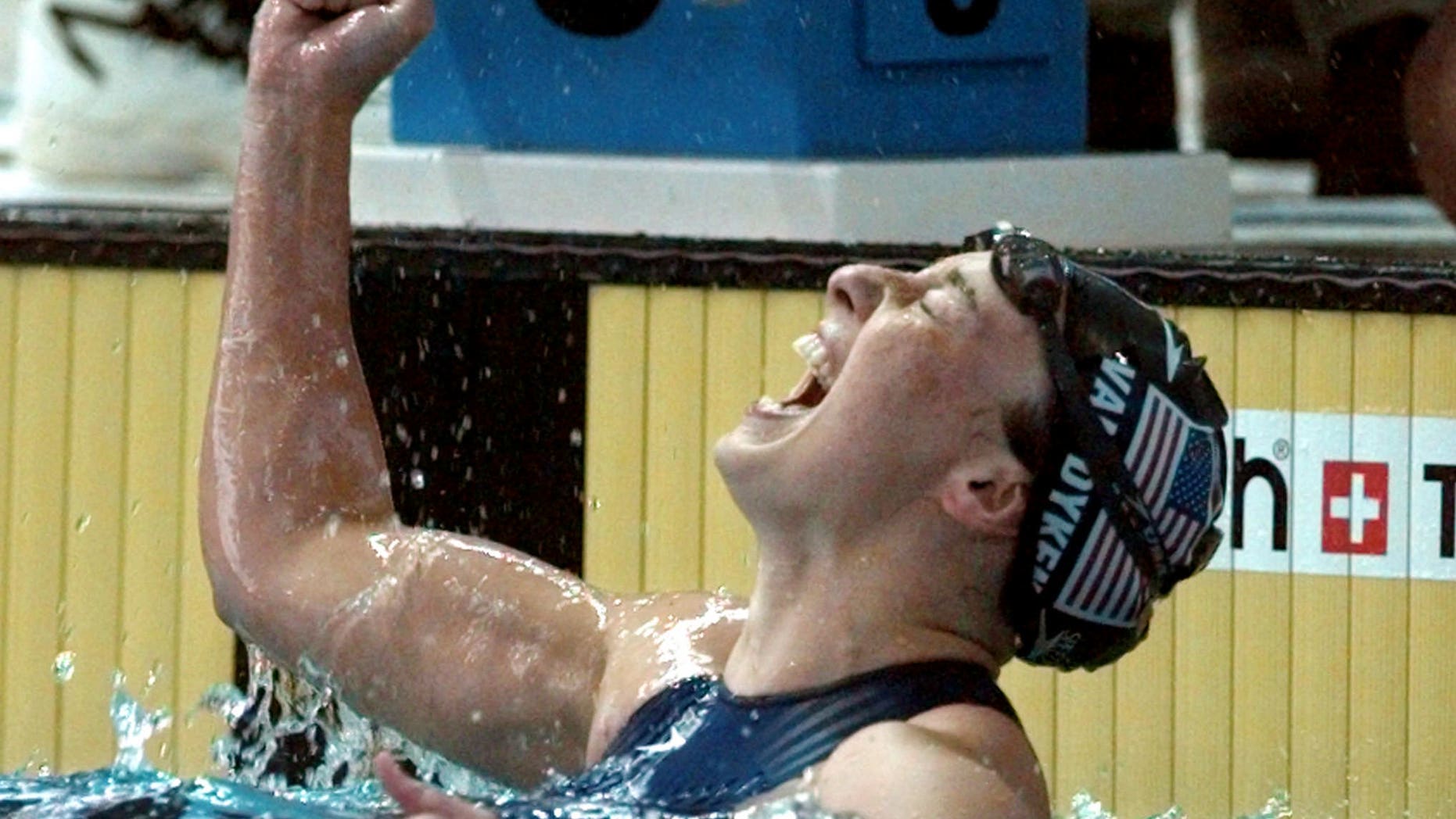 Amy Van Dyken celebrates after winning a gold medal in the 1996 Summer Olympic Games in Atlanta. Van Dyken has a severed spine after an accident on her all-terrain vehicle in Arizona. (AP Photo/David Longstreath, File)
