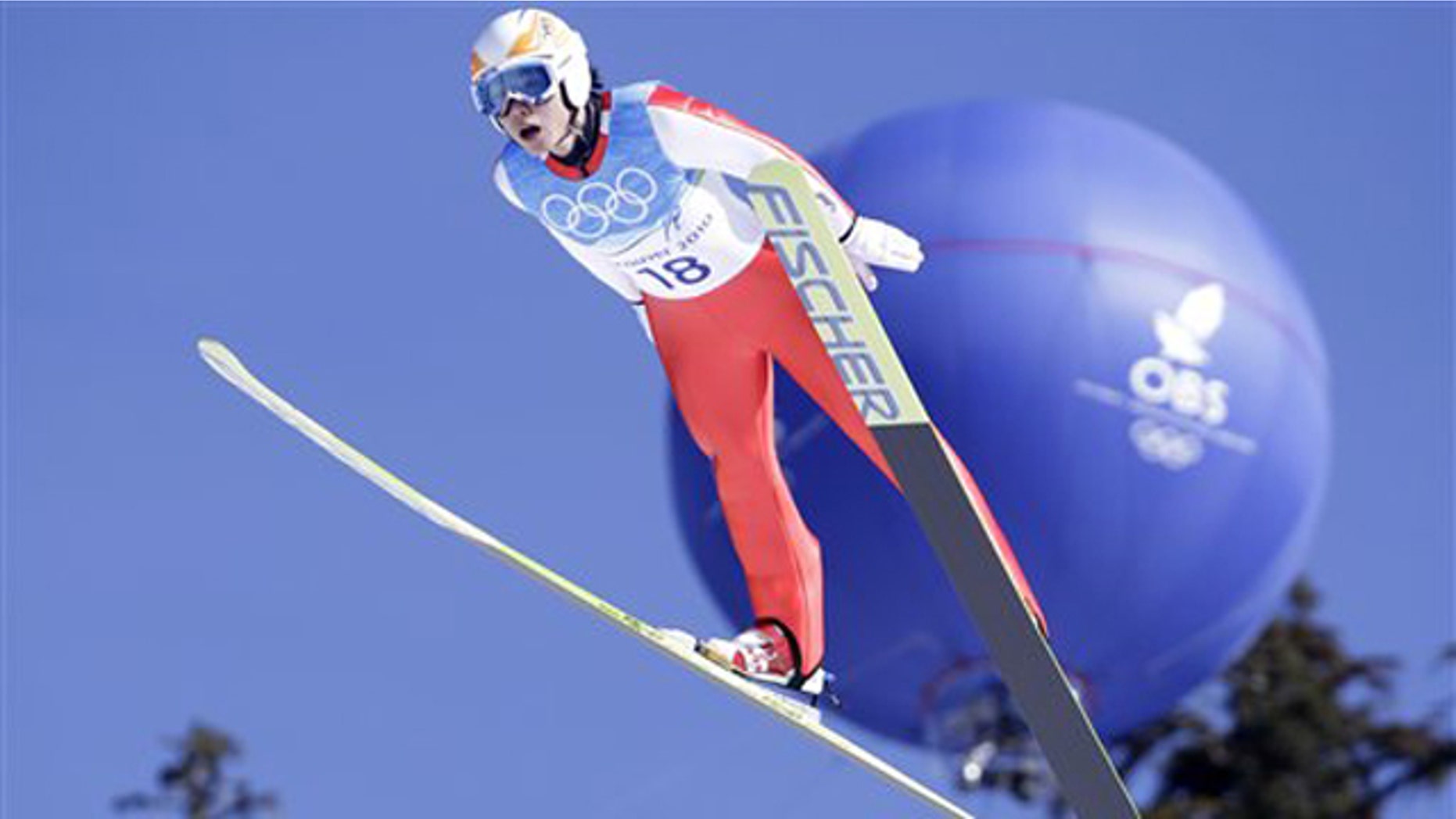 Korea's Kim Hyun-Ki makes an attempt during Men's large hill ski jumping training session at the Vancouver 2010 Olympics.